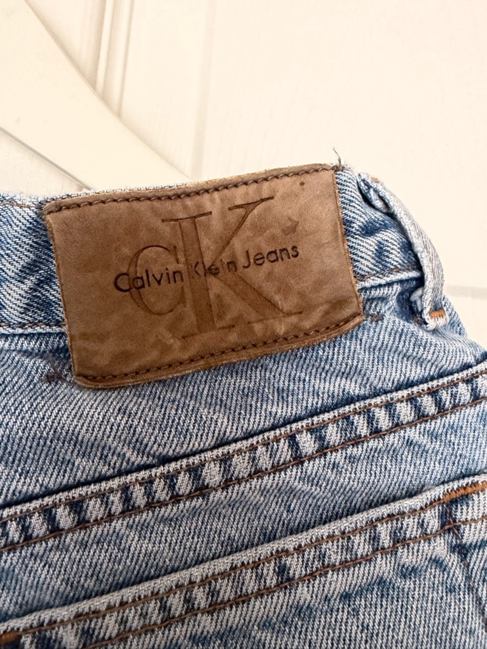 Calvin Klein Jeans 90s vintage Light Blue Denim with Brown Leather 90s logo OBO